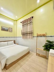 Postel nebo postele na pokoji v ubytování ARYE guest house