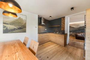 Kuchyň nebo kuchyňský kout v ubytování Naturoase Stegerhof Apt Iris