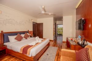 Voodi või voodid majutusasutuse Hotel Jungle Crown toas