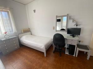 Postel nebo postele na pokoji v ubytování Coastal D