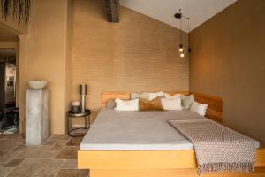 Voodi või voodid majutusasutuse Chalet Frederik toas