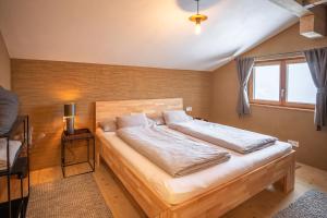 Voodi või voodid majutusasutuse Chalet Frederik toas