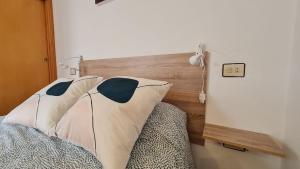 Ένα ή περισσότερα κρεβάτια σε δωμάτιο στο Apartamento Lo Pagan