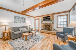 a living room with a couch and a fireplace at Near Shelby Farms & Greenline- Cordova Comfort in Memphis