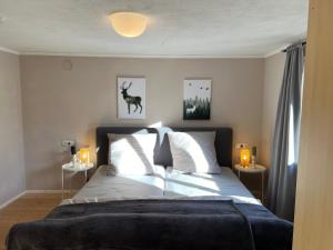 Postel nebo postele na pokoji v ubytování Beim Patzelt - Ferienhaus in Nesselwang