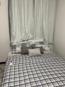 Posteľ alebo postele v izbe v ubytovaní Apartamento Barra Ondina