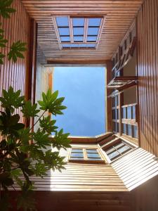 a view from the inside of a building with a window at Castelletto Bed & Breakfast in Santiago