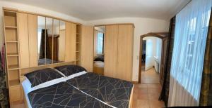Postel nebo postele na pokoji v ubytování Wohnung 5 mit Garten und sonniger Terrasse