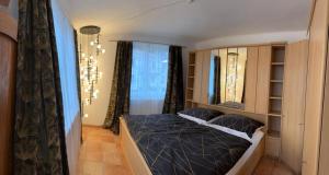 Postel nebo postele na pokoji v ubytování Wohnung 5 mit Garten und sonniger Terrasse