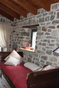 Postel nebo postele na pokoji v ubytování Eremo Gioioso