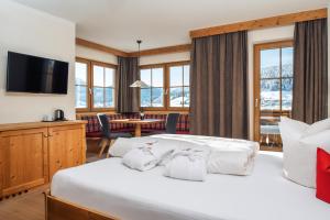 Postel nebo postele na pokoji v ubytování Hotel Garni am Sonnberg