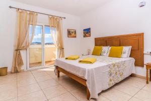 Postel nebo postele na pokoji v ubytování Villa San Andres + 37 fotografií