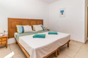 Posteľ alebo postele v izbe v ubytovaní Villa San Andres