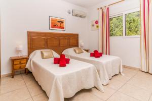 Posteľ alebo postele v izbe v ubytovaní Villa San Andres