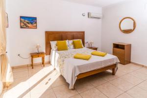 Posteľ alebo postele v izbe v ubytovaní Villa San Andres