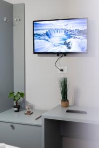 TV a/nebo společenská místnost v ubytování Tier Hotel