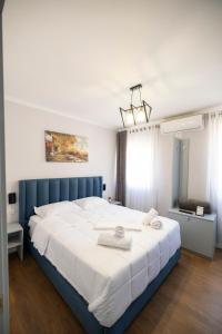 Postel nebo postele na pokoji v ubytování Tier Hotel + 37 fotografií
