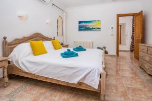 Postel nebo postele na pokoji v ubytování Villa Ermita
