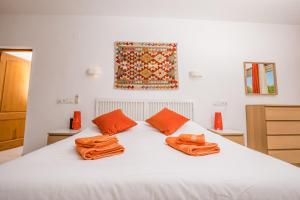 Postel nebo postele na pokoji v ubytování Villa Ermita