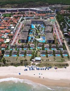 an aerial view of a resort on the beach at Cupe Beach Living Concept 304E in Porto De Galinhas