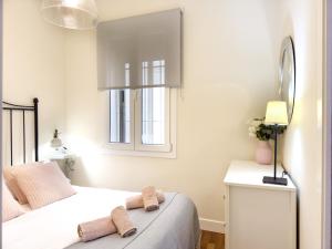 Postel nebo postele na pokoji v ubytování ApartamentoMálagaCentro