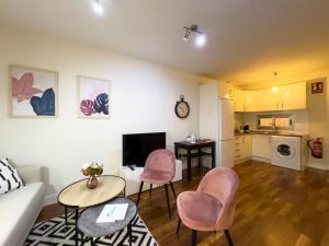 Kuchyň nebo kuchyňský kout v ubytování ApartamentoMálagaCentro