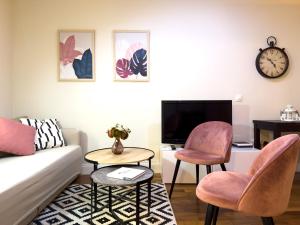 TV a/nebo společenská místnost v ubytování ApartamentoMálagaCentro + 10 fotografií