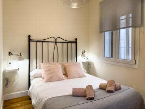 Postel nebo postele na pokoji v ubytování ApartamentoMálagaCentro