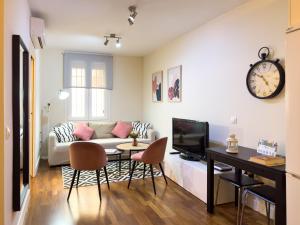 TV a/nebo společenská místnost v ubytování ApartamentoMálagaCentro