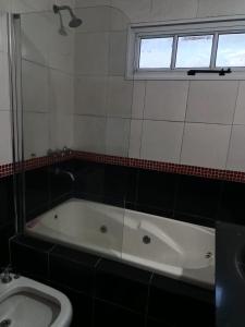 Ένα μπάνιο στο Casa Paraná
