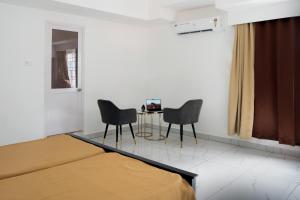 Katil atau katil-katil dalam bilik di Avanthi Homestay