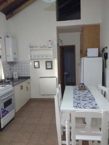 Køkken eller tekøkken på Azahares del Ayuí Oficial