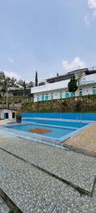 Bazén v ubytování villa sky valley puncak nebo v jeho okolí