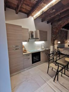 Η κουζίνα ή μικρή κουζίνα στο Mirto e Lavanda +7 φωτογραφίες