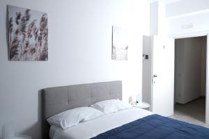 מיטה או מיטות בחדר ב-CIVICO 15 BED BREAKFAST