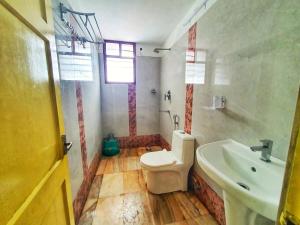 Kylpyhuone majoituspaikassa Hotel Prasanth
