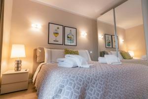 A bed or beds in a room at A.M. LUXURY HOME IN PUERTO RICO