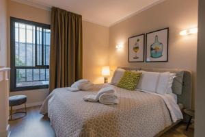 A bed or beds in a room at A.M. LUXURY HOME IN PUERTO RICO