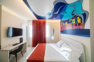 TV a/nebo společenská místnost v ubytování HAPPYROOMS + 37 fotografií