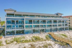 a large building with a lot of windows at Wait'n on Sundown in Destin