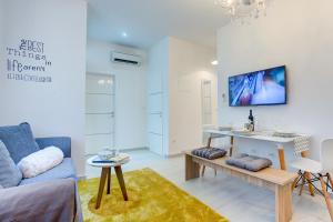 Televízia a/alebo spoločenská miestnosť v ubytovaní Apartment Melki