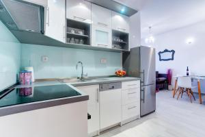 Kuchyňa alebo kuchynka v ubytovaní Apartment Melki