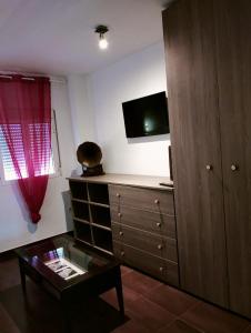 TV a/nebo společenská místnost v ubytování loft Alameda de Hercules