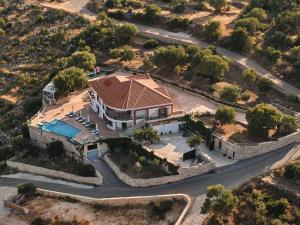 an aerial view of a house with a pool at Jessica Luxury Villa in Agios Nikolaos