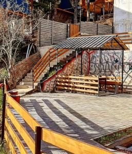 a skate park with a ramp and a gazebo at Cottage in Surami in Surami