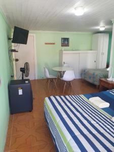 TV a/nebo společenská místnost v ubytování Residencial mi Casa