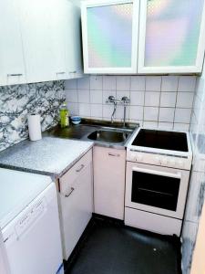 Η κουζίνα ή μικρή κουζίνα στο Your Second Home - Feel like home- Studio Apartment in Heart of City