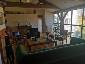 A seating area at Lumineuse Et Spacieuse Maison Style Loft