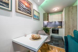 Kuchyň nebo kuchyňský kout v ubytování Noemi Luxury Apartment