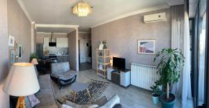 Posezení v ubytování Ameri Plaza Green Apartments